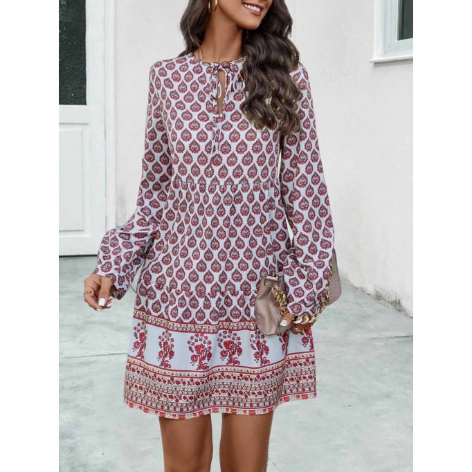 Long sleeve positioning print dress