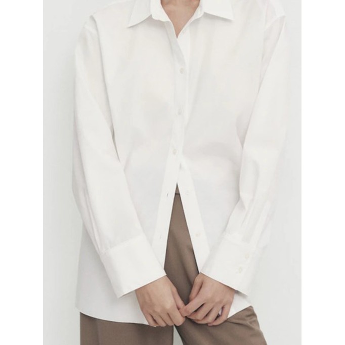 Women's long-sleeved white shirt with lapels