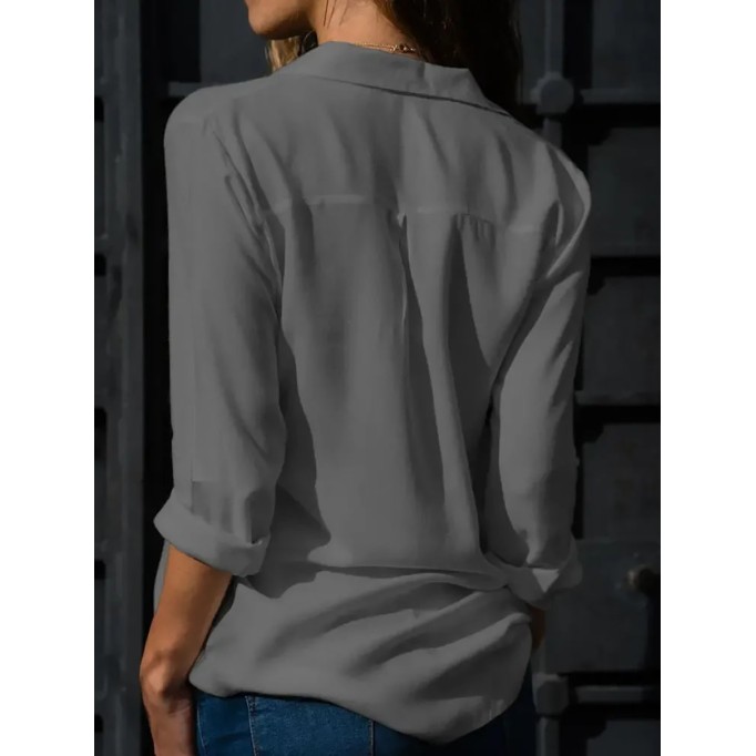 Women's solid color long sleeved button up shirt