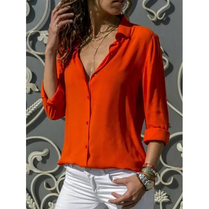 Women's solid color long sleeved button up shirt