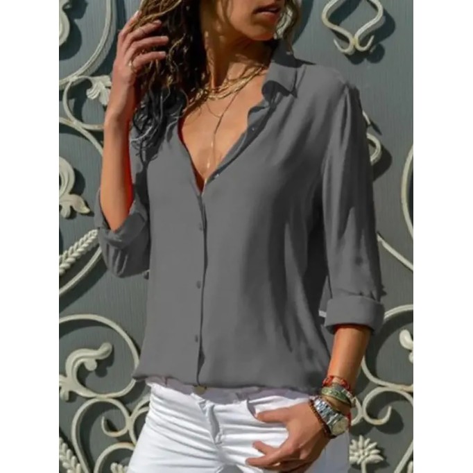 Women's solid color long sleeved button up shirt